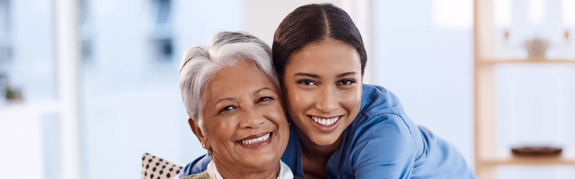 Compassionate caregiver supporting a senior client at home in Westchester, Illinois - Hero Slide 1